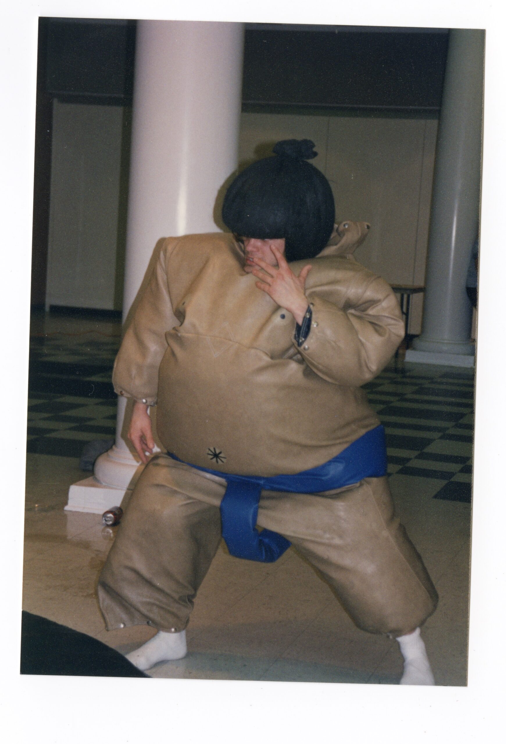 A student is wearing an inflatable sumo suit, signaling that they are ready to wrestle.